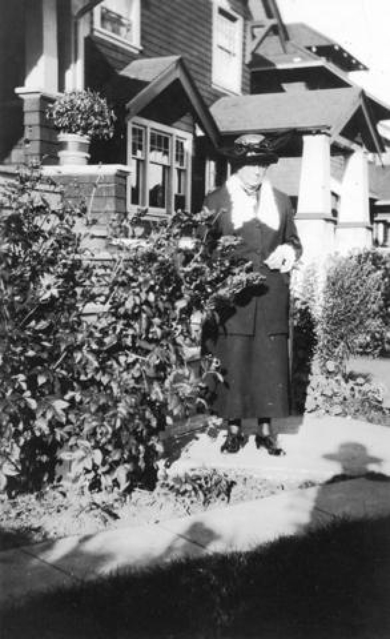 Mrs. Duncan R. Reid in front of her daughter's house at 3263 West 2nd Avenue c. 1933
Source: City of Vancouver Archives Item : Port P396.3 - [Mrs. Duncan R. Reid in front of her daughter's house at 3263 West 2nd Avenue]