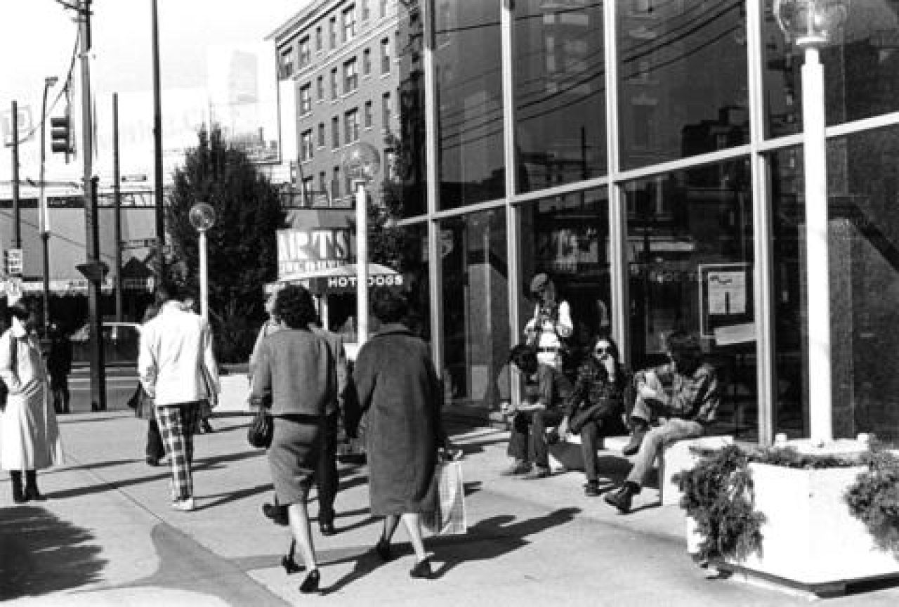 Sidewalk scene outside of NW corner of former Vancouver Public Library. City of Vancouver Archives CVA 69-04.
