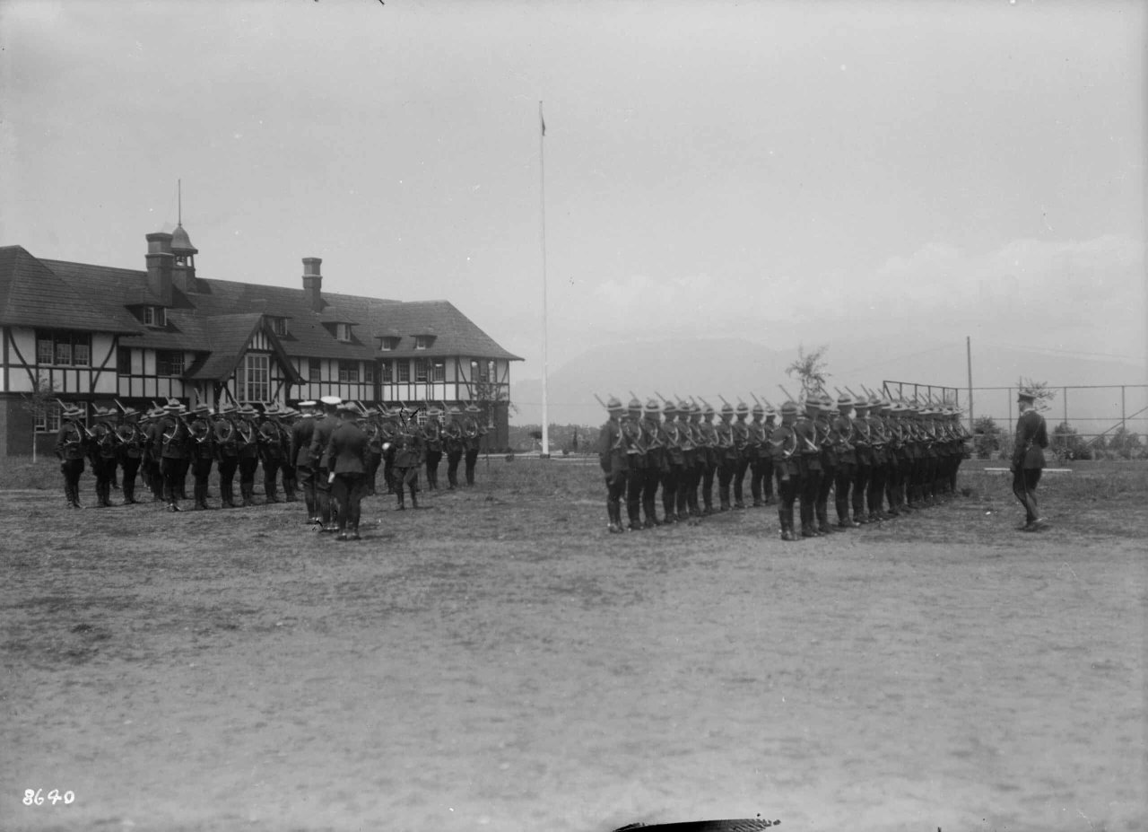 RCMP standing in formation outside Fairmont Barracks, 1918. City of Vancouver Archives, CVA 99-908.6.