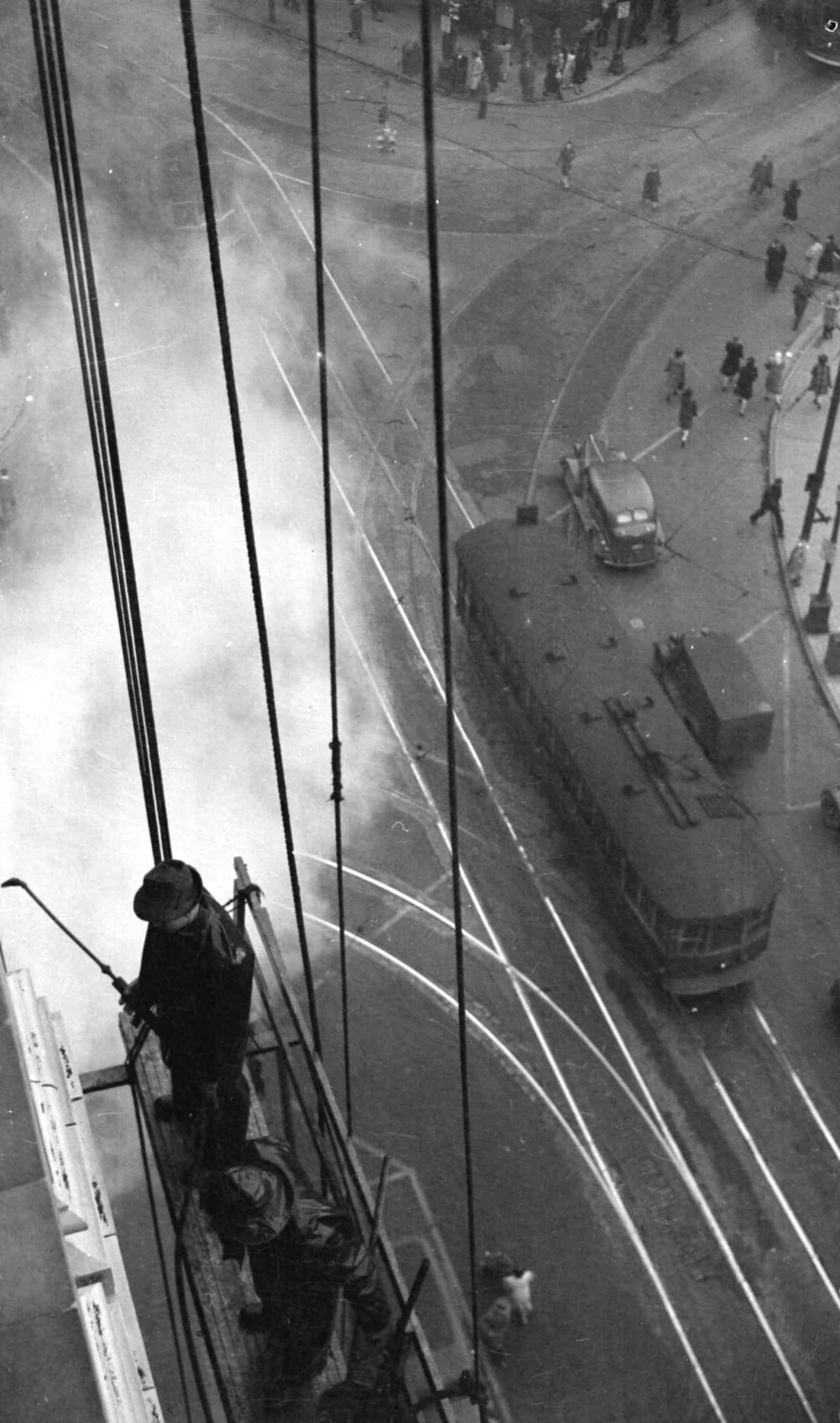 Workers cleaning the exterior of the Dominion Building in 1944. Source: City of Vancouver Archives 1184-225.