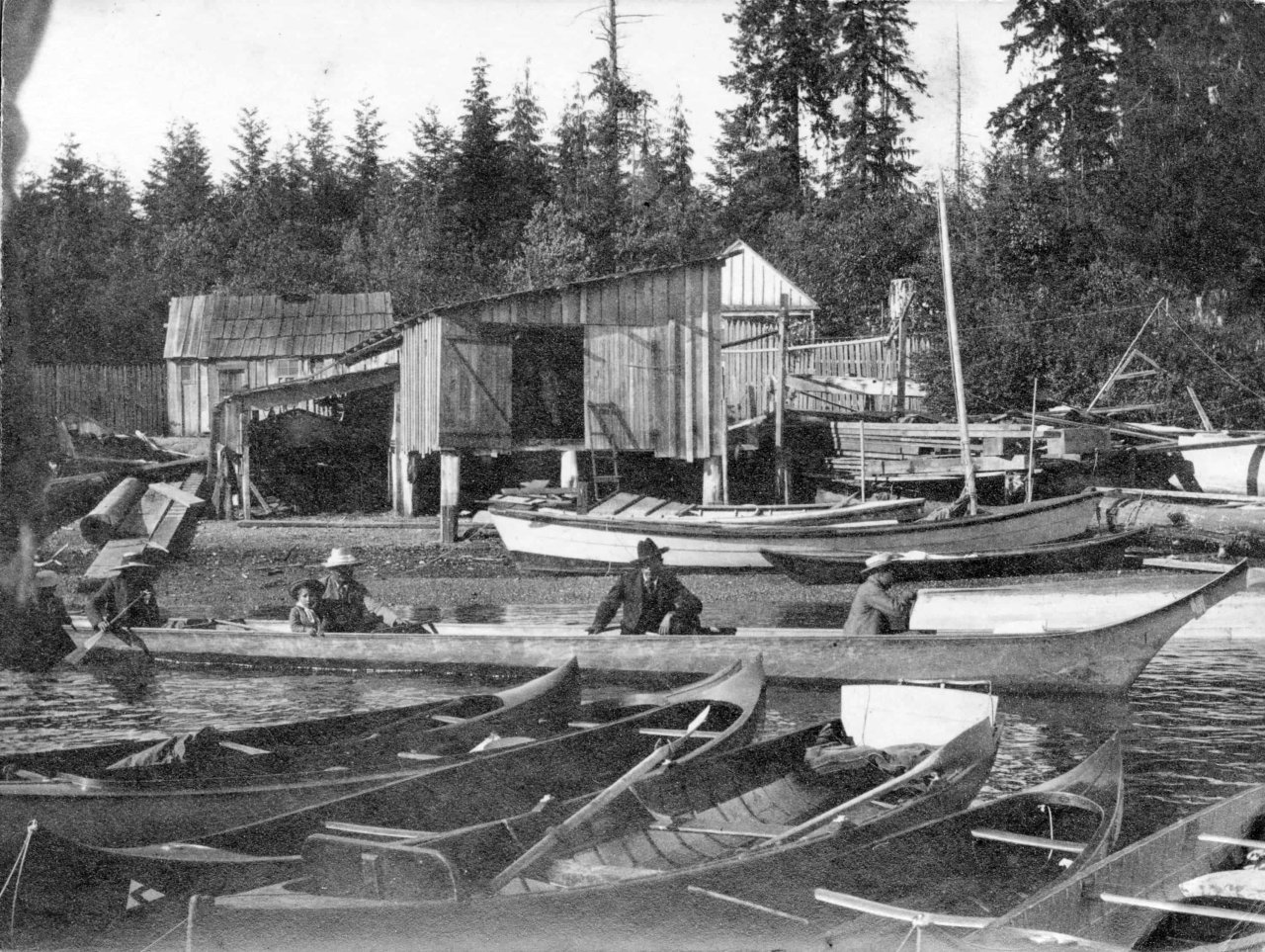 Source: City of Vancouver Archives Item: cva 371-2196 – [Canoes and a boathouse at Brockton Point]