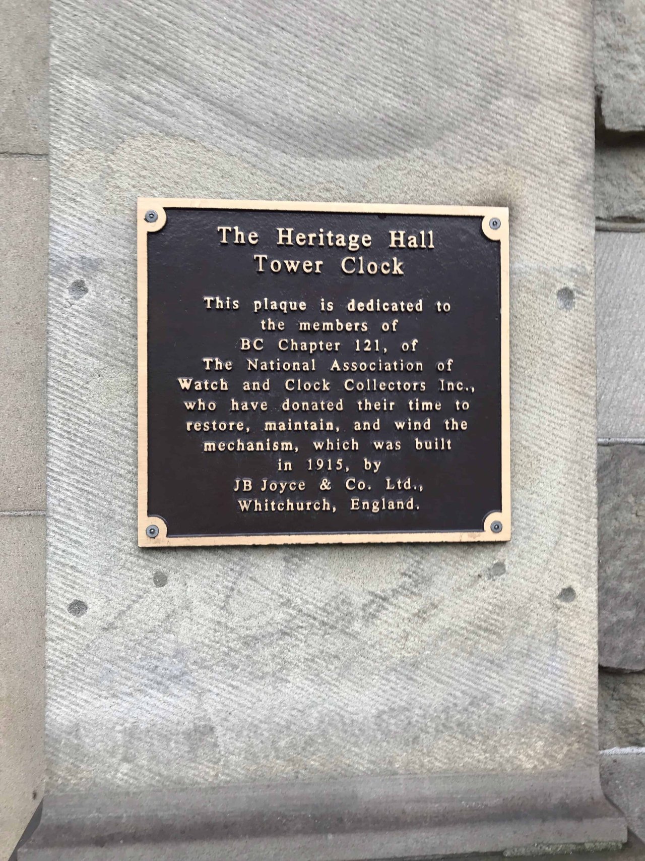 Heritage Hall Tower Clock Plaque. Credit: Jessica Quan