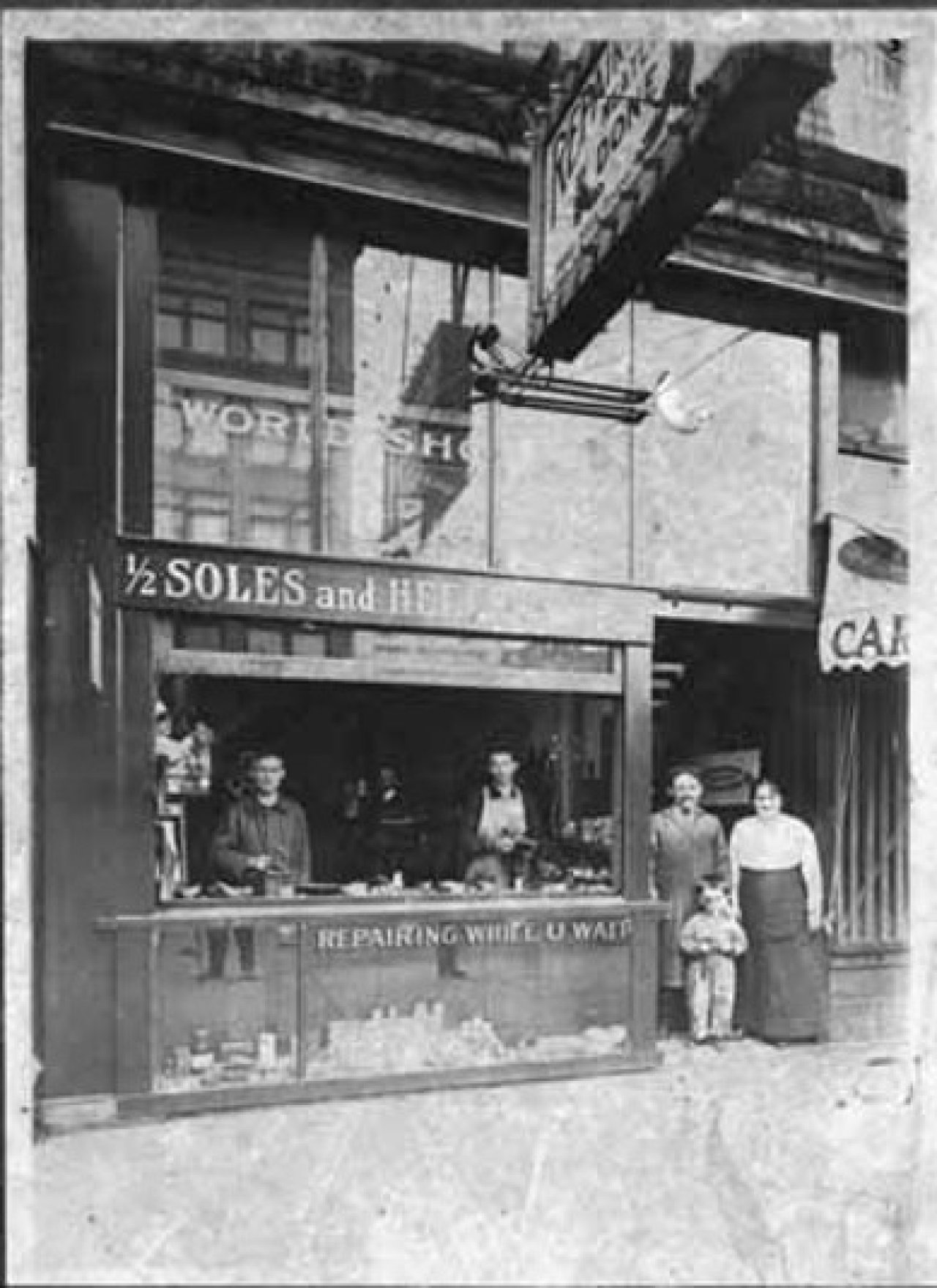 Exterior of 1/2 Soles and Heels - Pierre Paris' World Shoe Hospital. Credit: Vancouver Public Library 84915