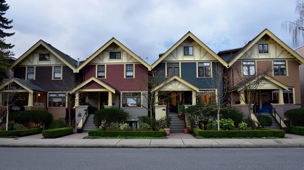 Houses along W 11th Avenue . Roaming-the-planet