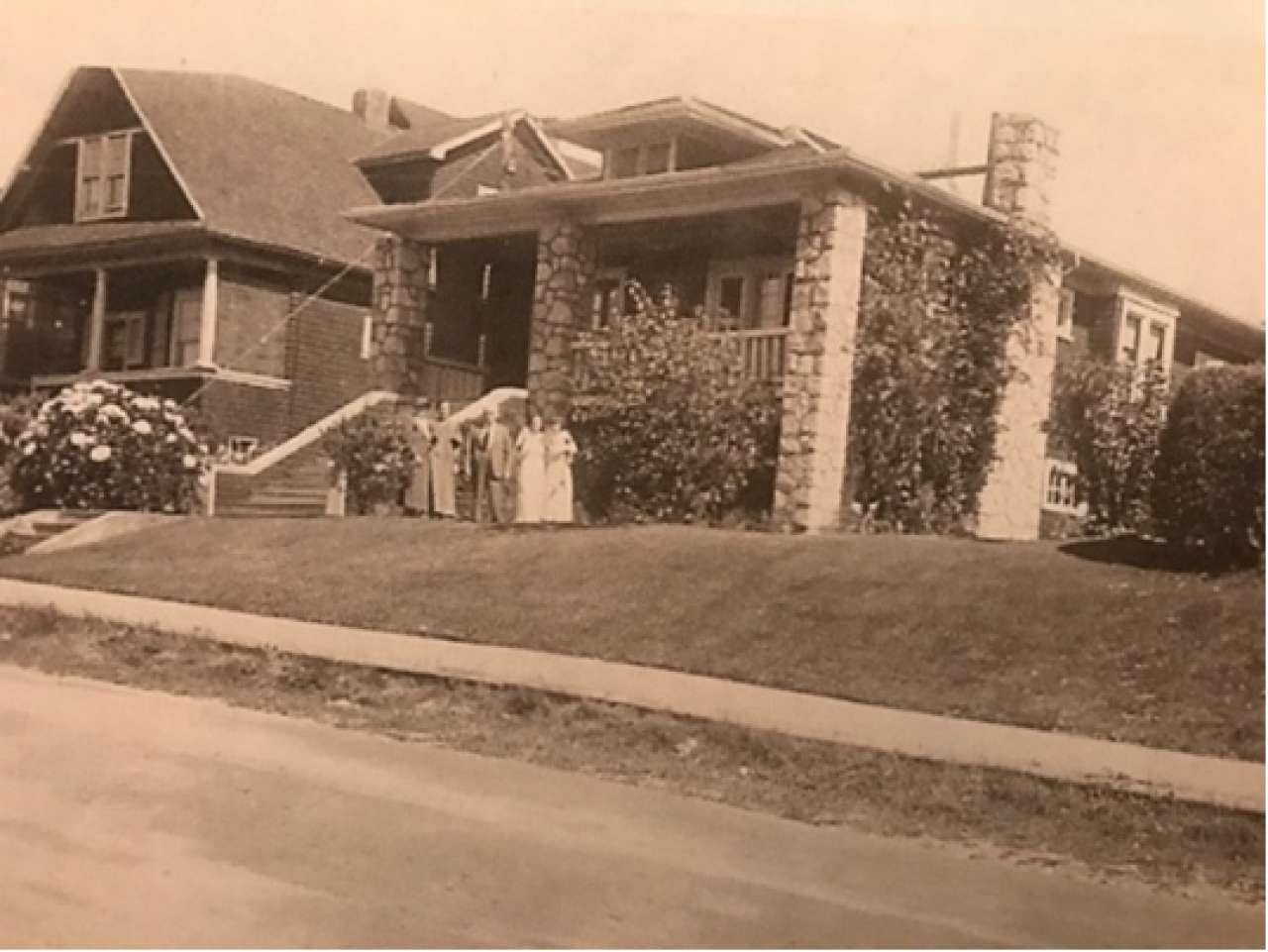 Photo of the West Side of 1834 Trafalgar Street. In front of the house stands William Muir and his two daughters. PC Grant Lovelock.